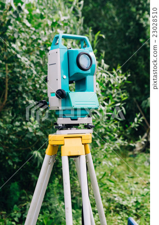 blue surveying equipment station background meadow blue surveying equipment station background meadow 23028510