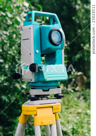blue surveying equipment station background meadow 23028511
