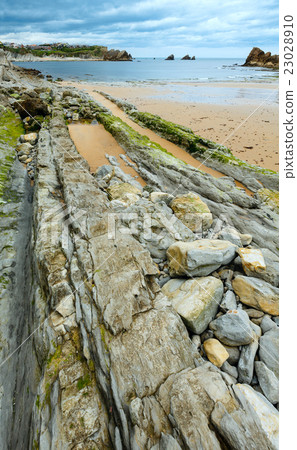 Portio Beach coastline landscape. 23028910