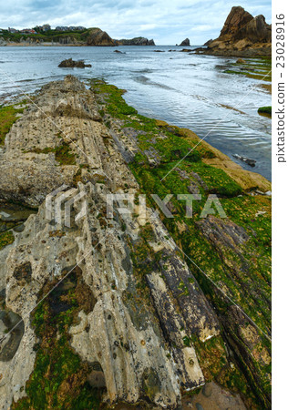 Portio Beach coastline landscape. 23028916