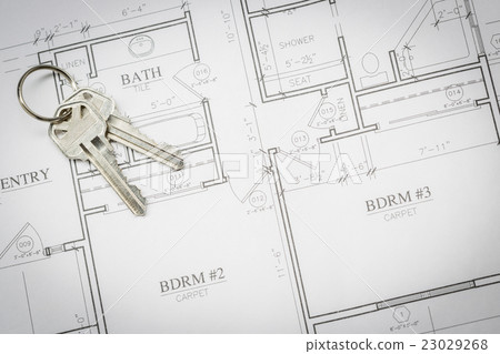 Set Of New House Keys Resting On House Plans Set Of New House Keys Resting On House Plans 23029268