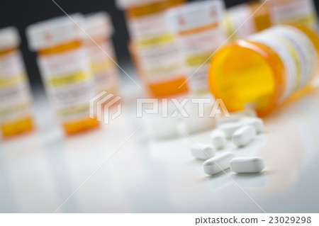Medicine Bottles,Pills Spilling From Fallen Bottle 23029298