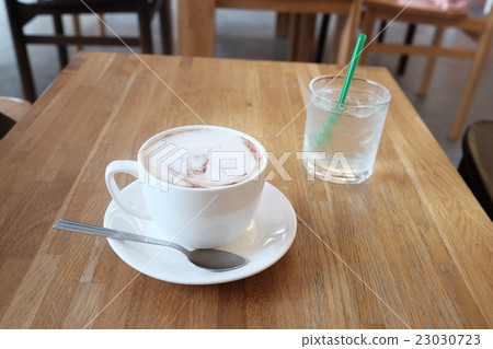 hot fresh coffee in cup and water 23030723