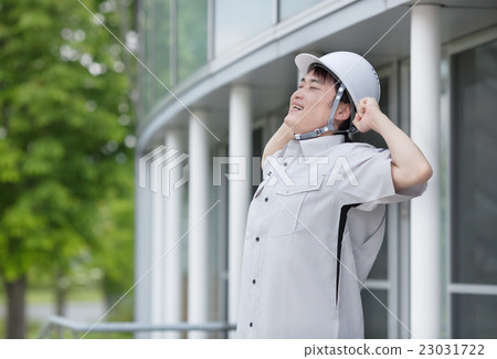 Middle aged man in work clothes 23031722