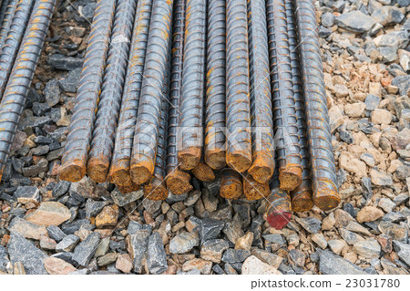 Steel rods or bars used to reinforce concrete 23031780