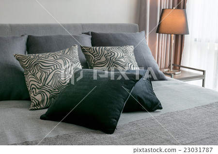 stylish bedroom with black patterned pillows 23031787