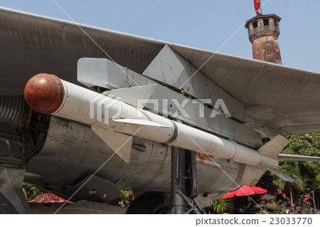 Air-to-air missile installed in Mig 21 fighter aircraft exhibited at Vietnam military history museum in Hanoi, Vietnam 23033770
