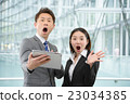 Men and women in business suit in a skyscraper 23034385