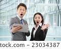 Men and women in business suit in a skyscraper 23034387