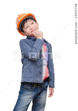 Young boy wearing helmet and thinking over white 23035749