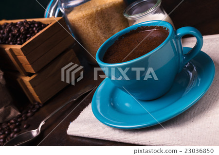 cup of coffee and jute bags, wooden container cup of coffee and jute bags, wooden container 23036850