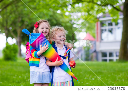 Kids with candy cone on first school day. Germany Kids with candy cone on first school day. Germany 23037878