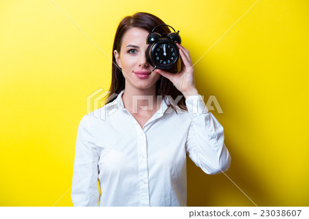 portrait of young woman with clock portrait of young woman with clock 23038607