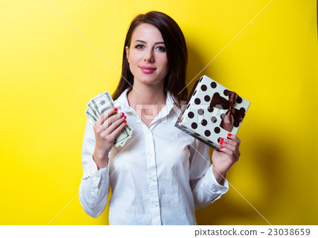 young woman with gift and money young woman with gift and money 23038659