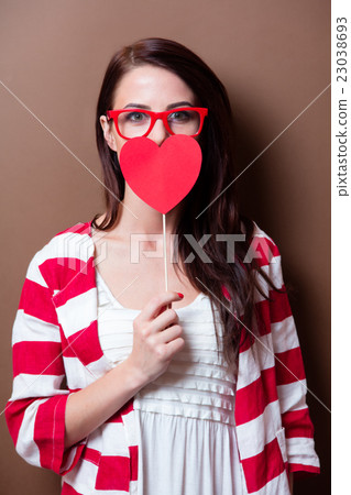 young woman with toy young woman with toy 23038693