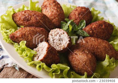 spicy Kubbeh with bulgur, onion and pine nut macro spicy Kubbeh with bulgur, onion and pine nut macro 23039408