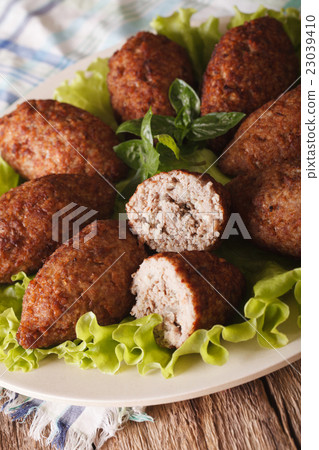 spicy Kubbeh with bulgur, onion and pine nut macro spicy Kubbeh with bulgur, onion and pine nut macro 23039410