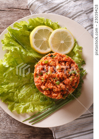 Traditional Turkish bulgur salad Kisir close-up 23039428