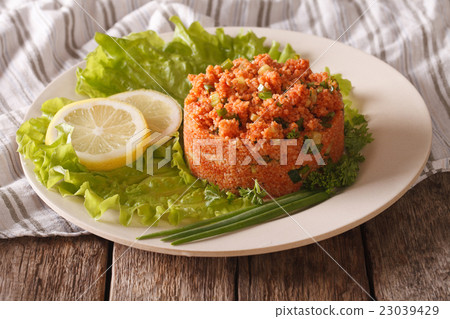 Turkish k?s?r spicy salad of bulgur with herbs 23039429