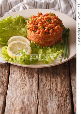 Turkish appetizer spicy k?s?r of bulgur with herbs 23039431
