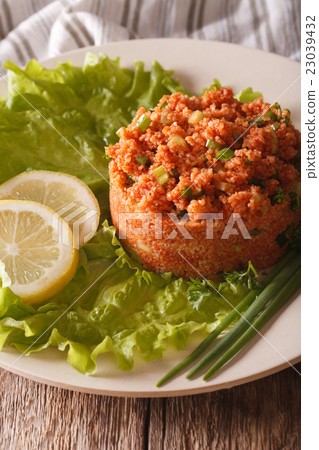 Turkish appetizer spicy Kisir closeup on the table 23039432