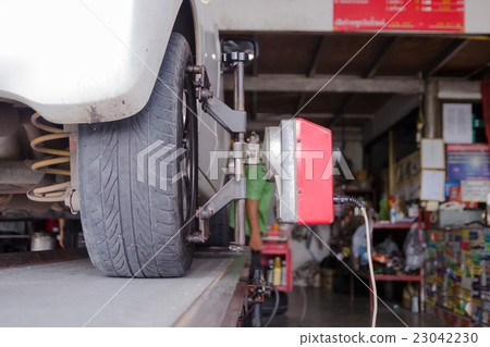 Close up shot of car wheel centering machine  23042230