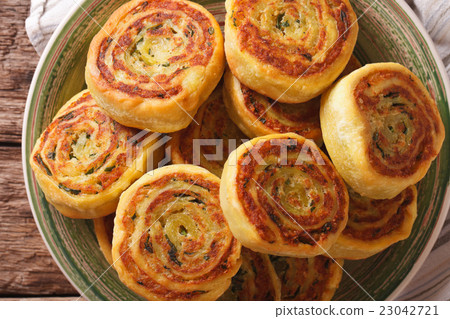 Tasty sliced potato roll closeup on a plate Tasty sliced potato roll closeup on a plate 23042721