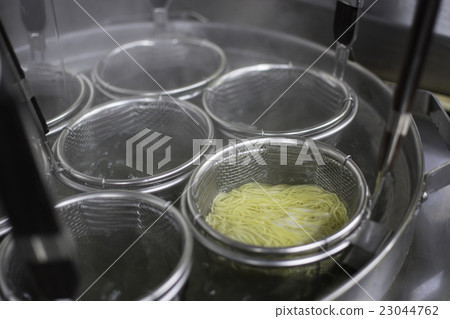 Boiling ramen in the kitchen Boiling ramen in the kitchen 23044762