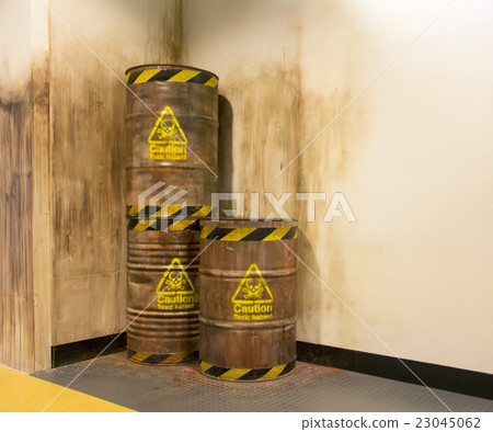 Old chemical barrel in warehouse 23045062