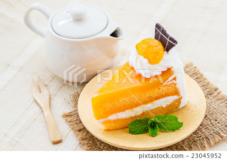 orange cake with chocolate and topping. orange cake with chocolate and topping. 23045952