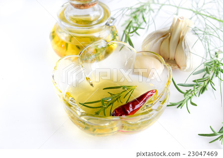 Olive oil and herbs 23047469