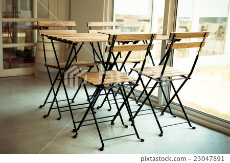 Empty table and chair 23047891