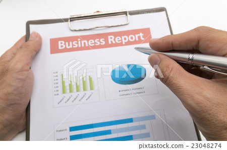 business report and man hand. 23048274