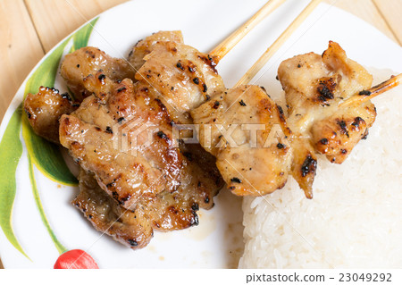 Thai grilled pork and Sticky rice Thai grilled pork and Sticky rice 23049292