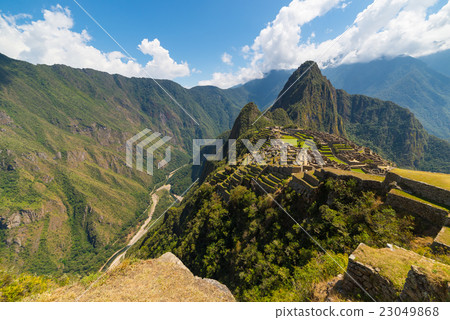 Machu Picchu illuminated by the sunlight. 23049868