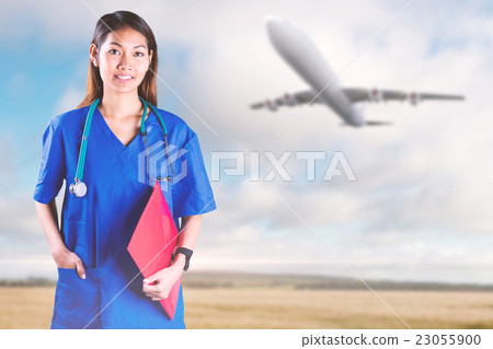 Composite image of asian nurse with stethoscope looking at the c Composite image of asian nurse with stethoscope looking at the c 23055900