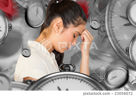 Composite image of casual upset businesswoman with head bowed Composite image of casual upset businesswoman with head bowed 23056072
