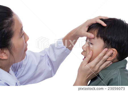 Boy with an injure eye. Doctor first aid a patient Boy with an injure eye. Doctor first aid a patient 23056073