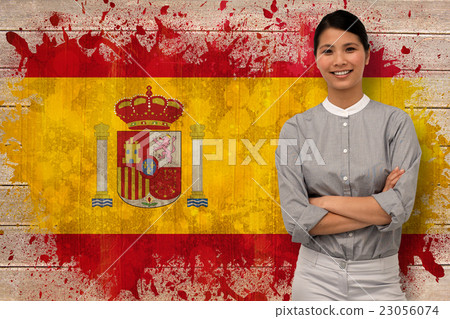 Composite image of selfassured businesswoman with folded arms Composite image of selfassured businesswoman with folded arms 23056074