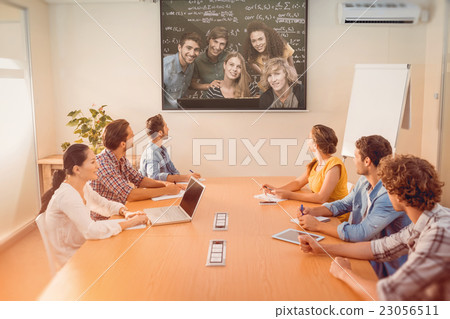 Composite image of college students using computer 23056511