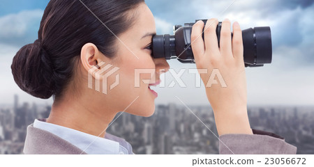 Composite image of side view of a businesswoman looking through Composite image of side view of a businesswoman looking through 23056672