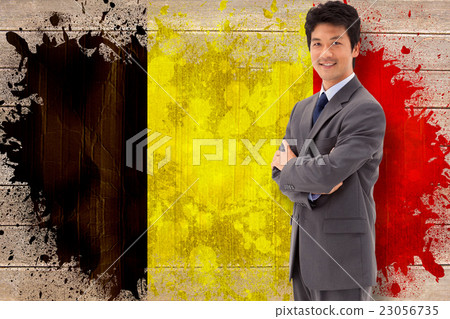 Composite image of portrait of a smiling businessman with the ar Composite image of portrait of a smiling businessman with the ar 23056735