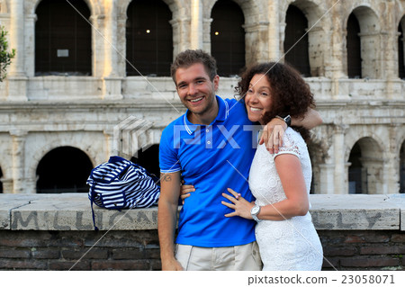 Young couple on the background of the Colosseum Young couple on the background of the Colosseum 23058071