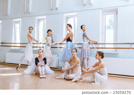 The seven ballerinas at ballet bar The seven ballerinas at ballet bar 23059270