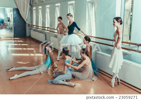 The seven ballerinas at ballet bar The seven ballerinas at ballet bar 23059271