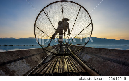 Fishermen in Inle Lake at sunrise, Myanmar Fishermen in Inle Lake at sunrise, Myanmar 23059646