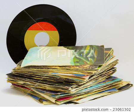 pile of 45 RPM vinyl records used and dirty even 23061302