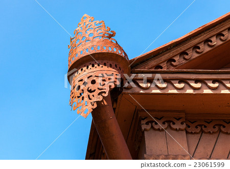 The old rainwater downpipe on wooden house 23061599