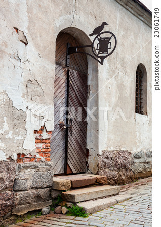 Old wooden gate at the medieval castle in Vyborg Old wooden gate at the medieval castle in Vyborg 23061749