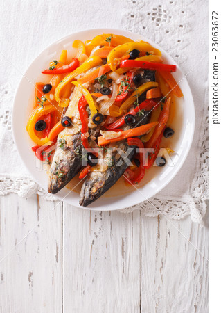 Mackerel in vegetable marinade close-up 23063872